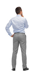 Image showing businessman thinking from back