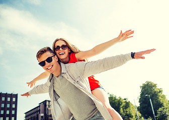 Image showing smiling couple having fun in city