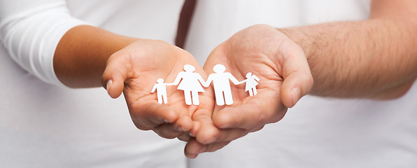 Image showing couple hands with paper man family