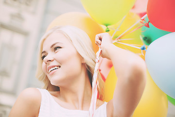 Image showing woman with colorful balloons