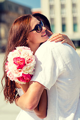 Image showing smiling couple in city