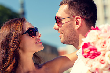 Image showing smiling couple in city