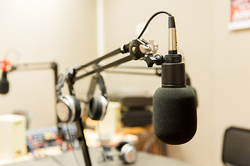 Image showing microphone at recording studio or radio station