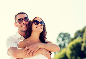 Image showing smiling couple in city