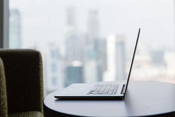 Image showing close up of laptop computer on table at office