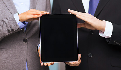 Image showing businessman and businesswoman with tablet pc