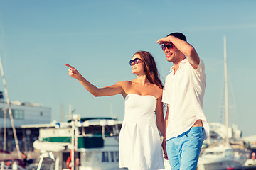 Image showing smiling couple in city