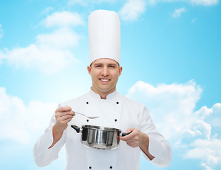 Image showing happy male chef cook with pot and spoon