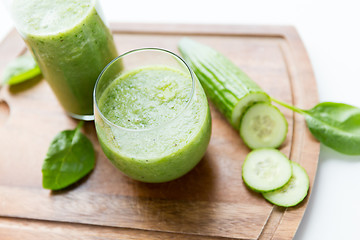 Image showing close up of fresh green juice glass and celery