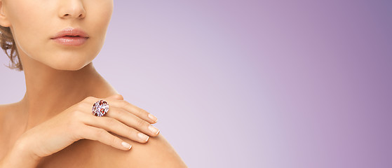 Image showing close up of woman with cocktail ring on hand