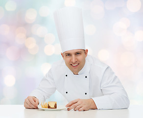 Image showing happy male chef cook with dessert
