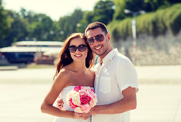 Image showing smiling couple in city