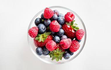 Image showing close up of summer berries in glass bowl
