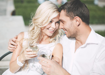 Image showing couple drinking wine in cafe