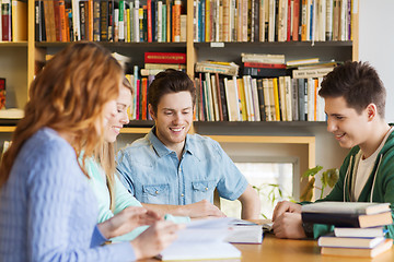 Image showing students with books preparing to exam in library