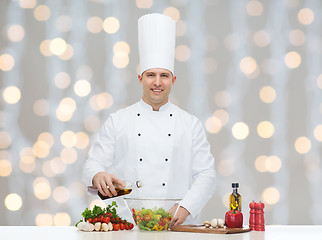 Image showing happy male chef cook cooking food