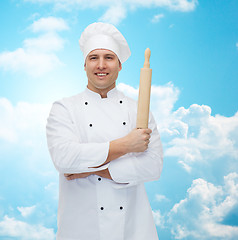 Image showing happy male chef cook holding rolling pin