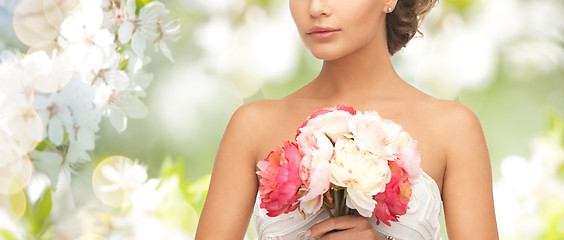 Image showing bride or woman with bouquet of flowers