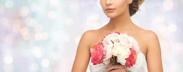 Image showing bride or woman with bouquet of flowers