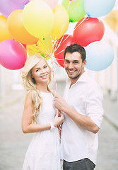 Image showing couple with colorful balloons