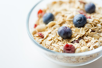 Image showing close up of bowl with granola or muesli on table