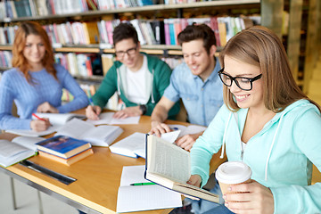 Image showing students reading and drinking coffee in library