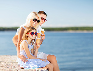 Image showing happy family eating ice cream