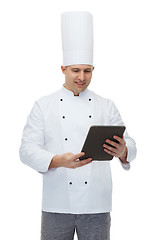 Image showing happy male chef cook holding tablet pc