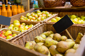 Image showing fruits in baskets with nameplates at food market