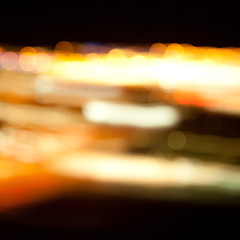 Image showing golden bright lights on dark night background