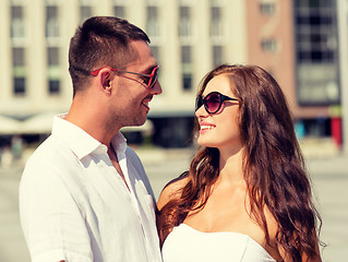 Image showing smiling couple in city