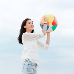 Image showing girl with ball on the beach