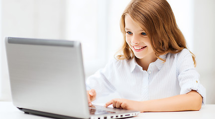 Image showing girl with laptop pc at school
