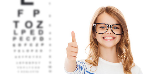 Image showing little girl with black eyeglasses