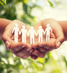 Image showing womans hands with paper team