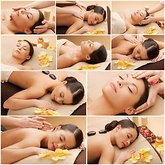 Image showing woman having facial or body massage in spa salon