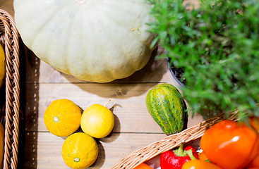 Image showing vegetables in baskets on table at market or farm