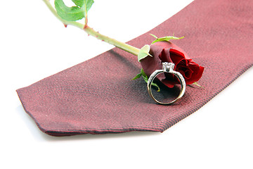 Image showing red tie and gold ring