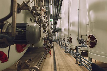 Image showing Large industrial white silos in modern factory