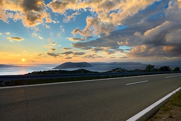 Image showing Beautiful coastal road at sunset