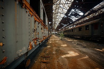 Image showing Cargo trains in old train depot