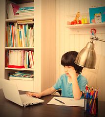 Image showing schoolboy doing homework