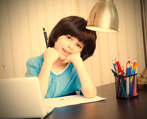 Image showing schoolboy doing homework