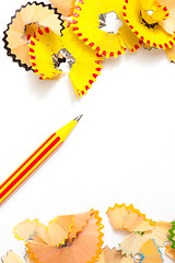 Image showing striped pencil and colored shavings