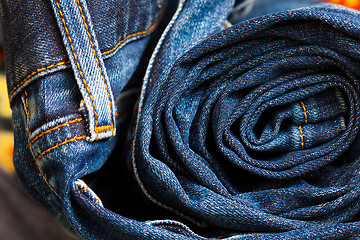 Image showing rolled jeans trousers 