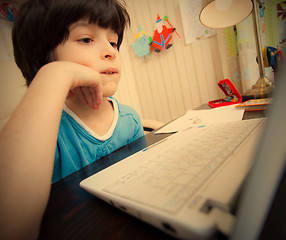 Image showing distance learning, a child with computer