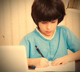 Image showing child doing homework