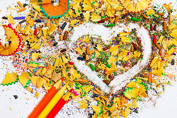 Image showing heart, three pencils and colored wooden shavings