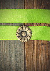 Image showing vintage button flower and two green tapes