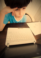 Image showing distance learning, a boy with computer